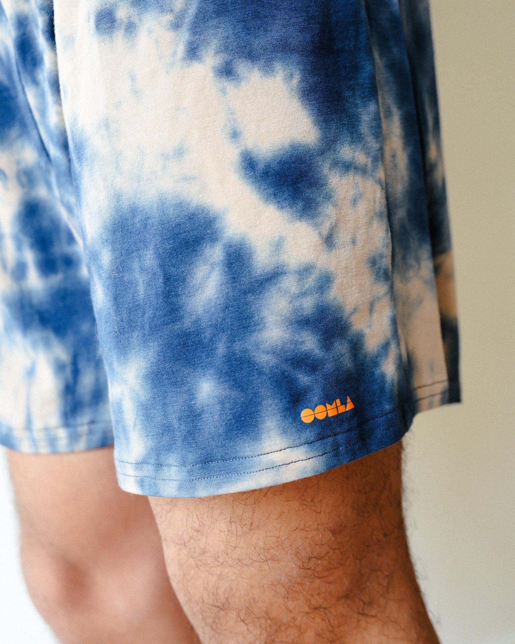 a close-up of the featured shorts, focusing on the OOMLA logo